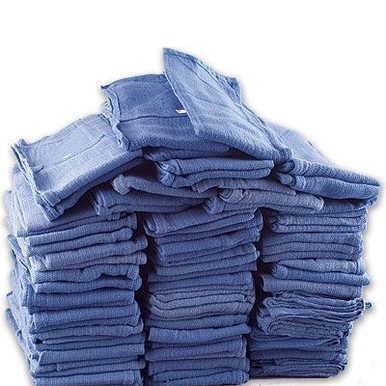 Blue shop towels stacked in packs